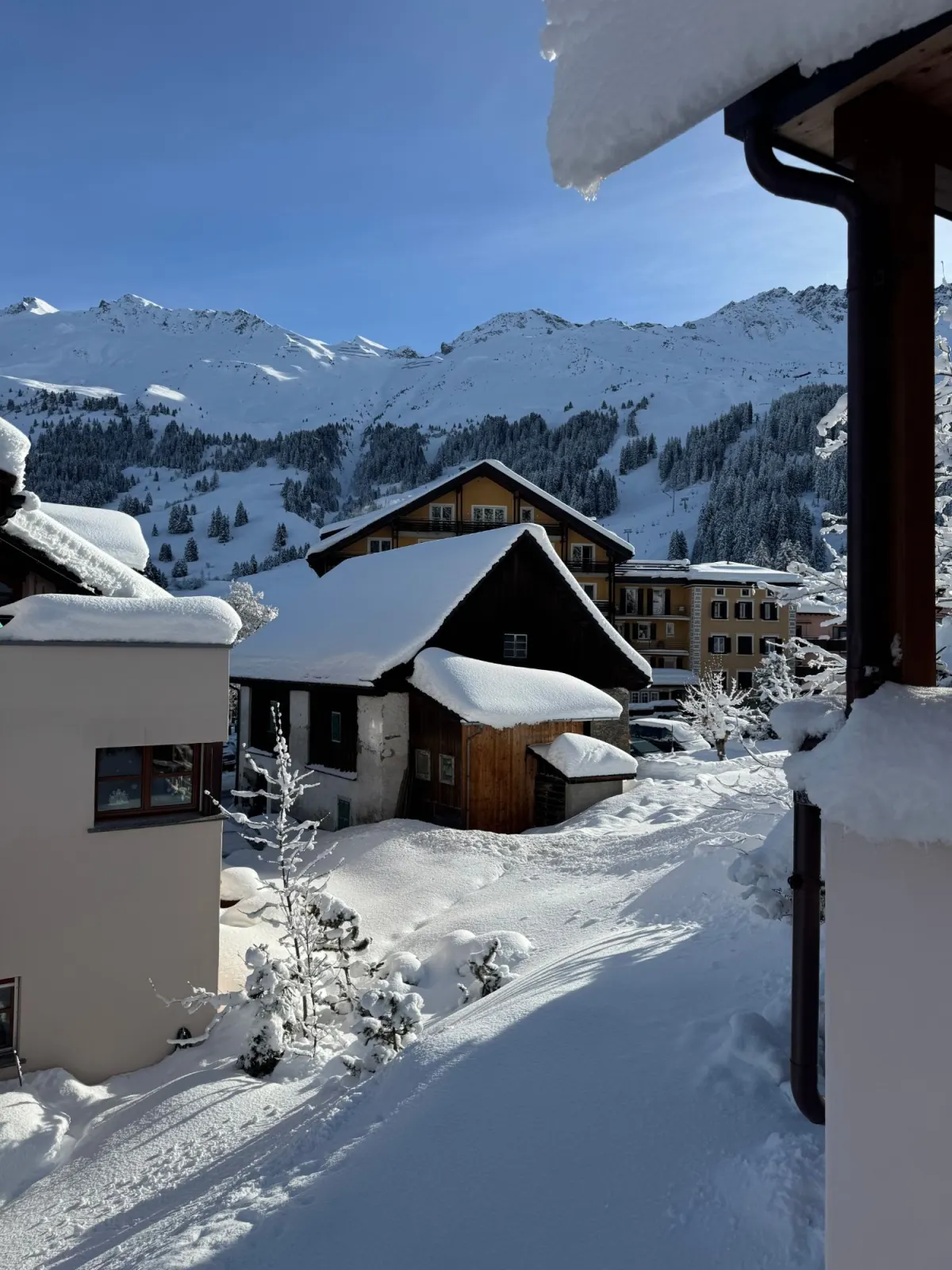 View from the house onto the snowy ski slopes and lifts